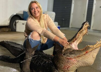 woman posing after gator hunt in florida